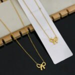 Golden Bow Charm Necklace