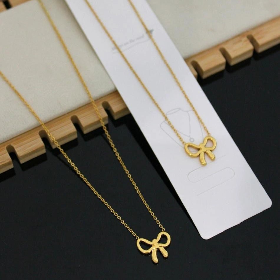 Golden Bow Charm Necklace