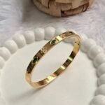 Emerald Charm Golden Kada