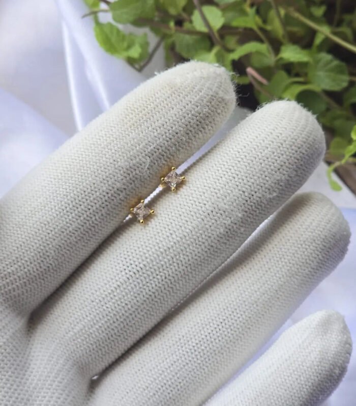 Princess Cut Gold Ear Piercing